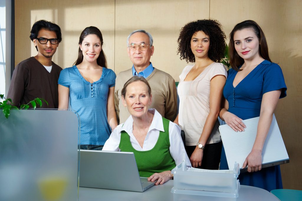 Illustrative photograph of a professional team in an office