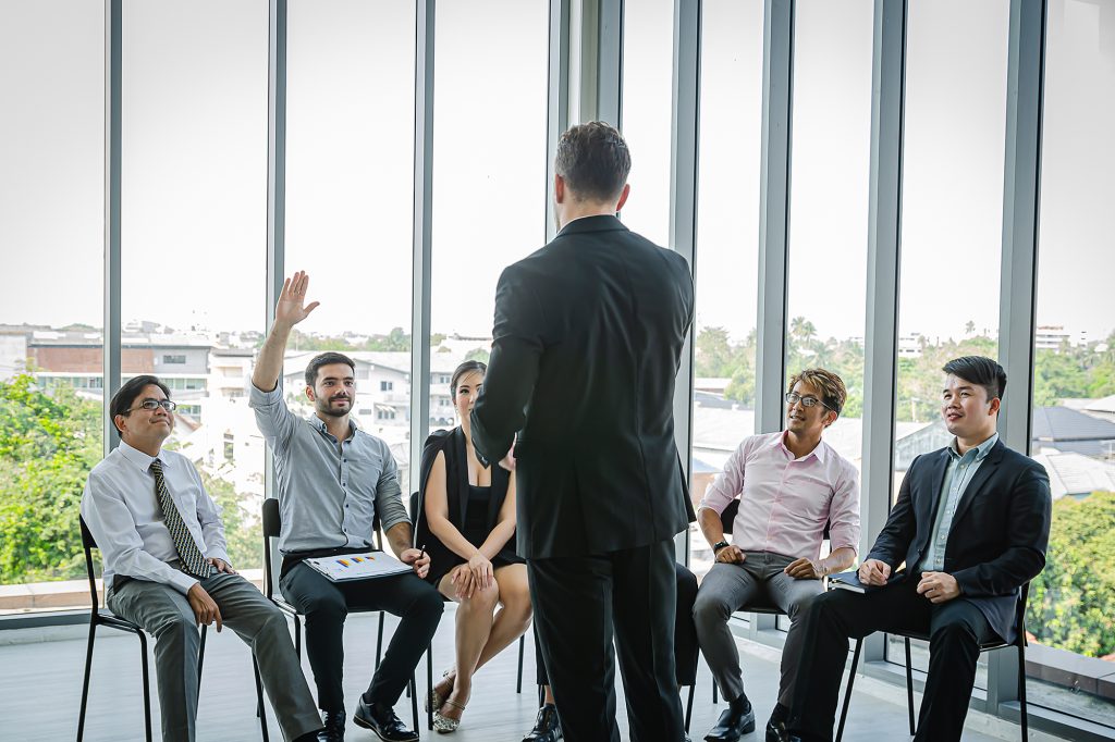 Illustrative business training and team discussion